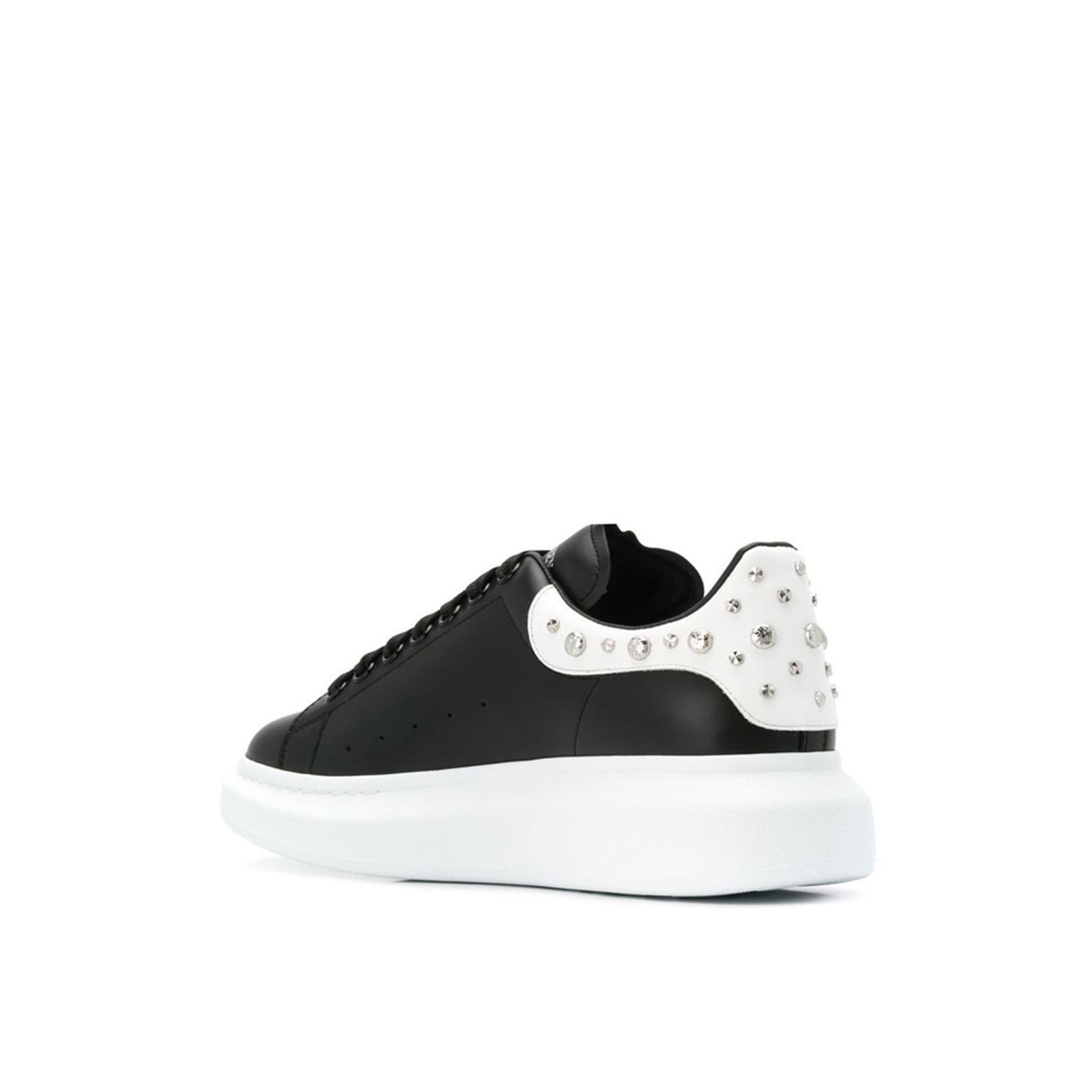 ALEXANDER MCQUEEN  Sneakers Alexander McQueen Nere in Pelle Borchiata Pezzi Unici