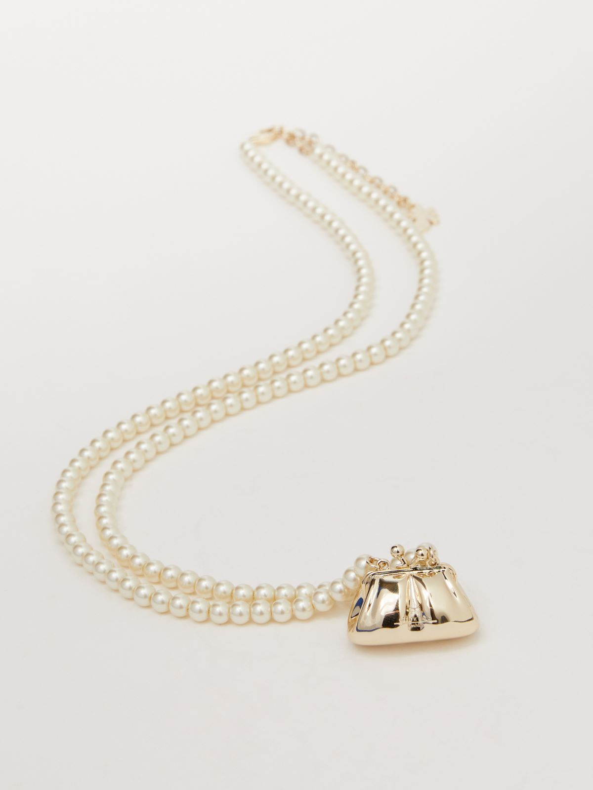 Weekend Collana di perle con charm Pasticcino In Vendita