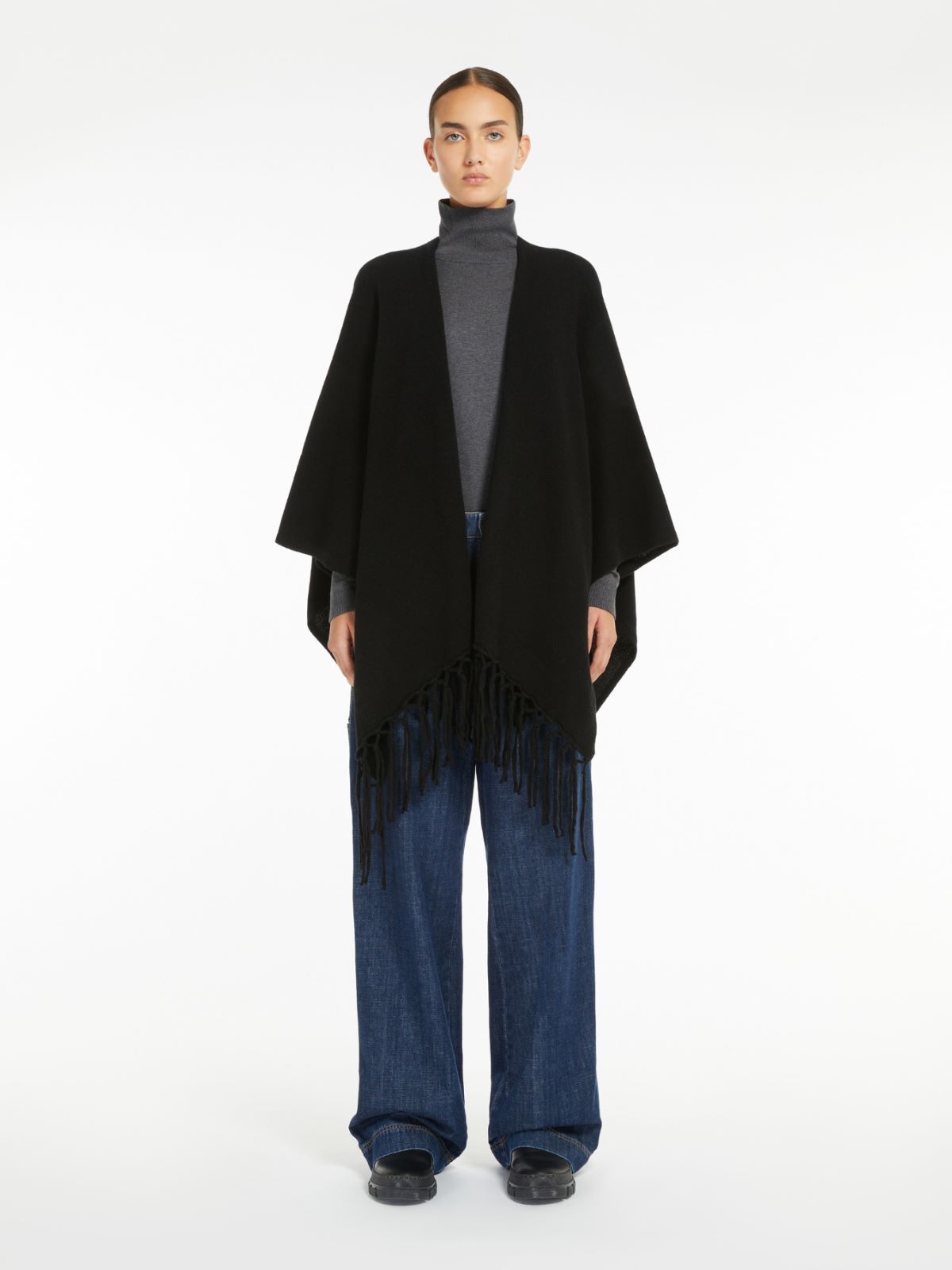 Weekend Poncho in pura lana Offerta