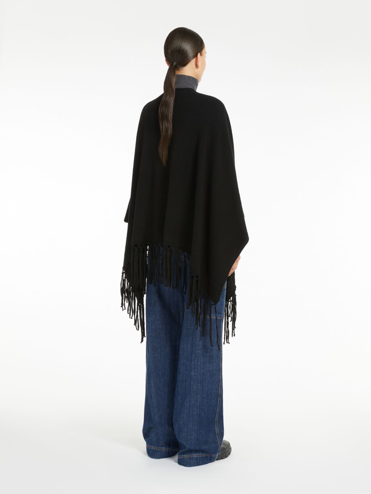 Weekend Poncho in pura lana Offerta